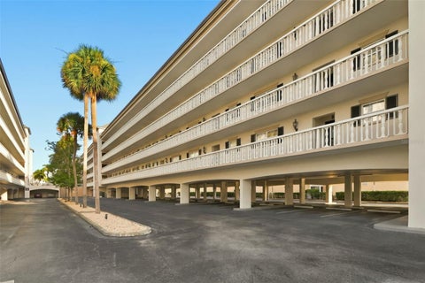 Photo of 131 Bluff View Drive #107, Belleair Bluffs, FL 33770 (MLS # TB8557263)
