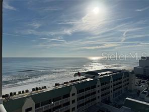 OCEAN-VIEW CONDO WITH NO LEASE RESTRICTIONS! This south-facing, one-bedroom condo with a full kitchen and walkout balcony is located within the desirable Daytona Beach Resort. This stylish unit showcases brand-new luxury vinyl plank flooring throughout, providing a modern and sophisticated aesthetic. Fully furnished and equipped with all appliances, this condo is move-in ready. The Daytona Beach Resort boasts an impressive array of amenities, creating an exceptional resort-living experience. Enjoy access to two oceanfront pools, a kid-friendly pool, an oceanfront Tiki bar, and a fire pit for ultimate relaxation. For indoor enjoyment, the resort features a heated pool, two hot tubs, a sauna, and a bar/restaurant. A fully equipped fitness center and laundry facilities are also available on-site, enhancing the convenience and comfort of your stay. Additionally, the resort offers bike rentals, perfect for exploring the scenic beachfront at your own pace. Positioned directly across from Bellair Shopping Plaza, which includes popular retailers like Marshalls, Walgreens, Bealls, Five Below, and Dollar Tree, this location provides unparalleled convenience for all shopping and dining needs. Whether you are seeking a vacation haven or a savvy investment, this property presents a compelling blend of lifestyle and opportunity.