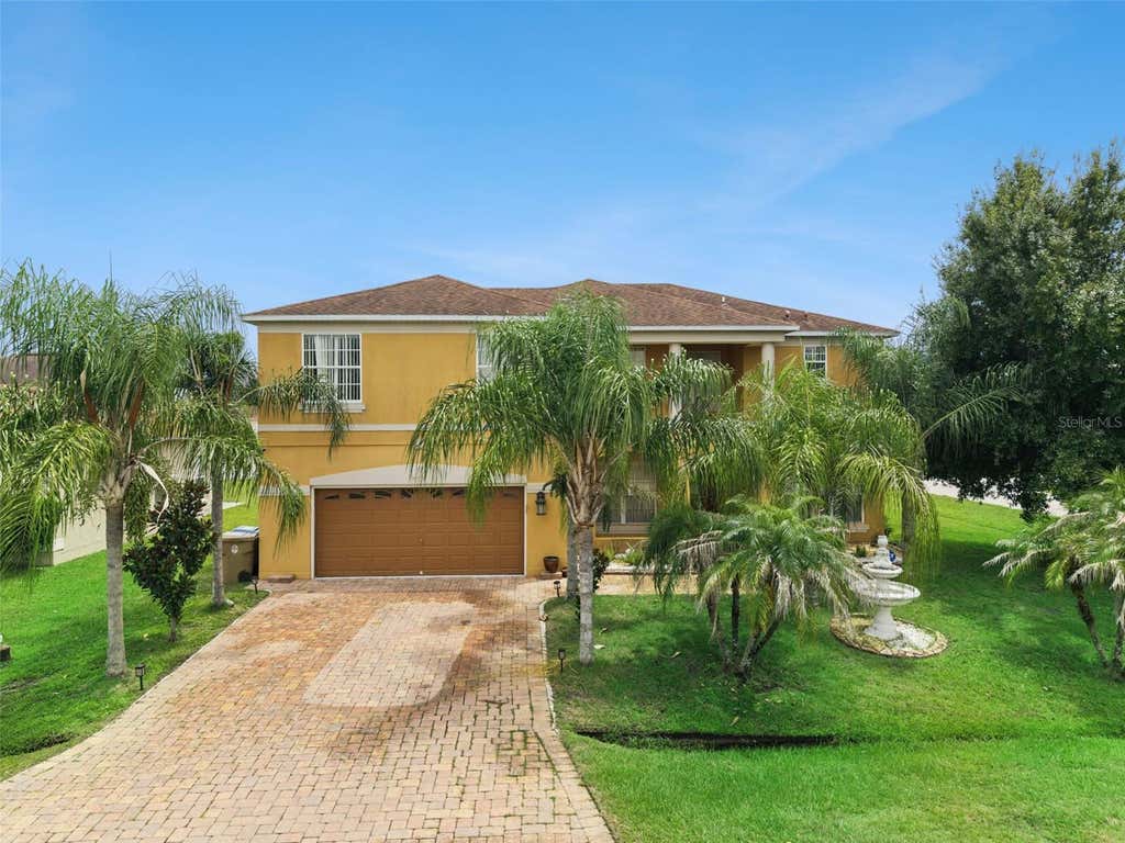Photo of 331 Ashburton Way, Kissimmee, FL 34758 (MLS # O6431564)