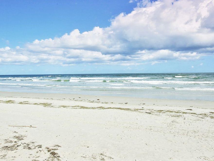 Exceptional two bedroom-two bath direct oceanfront top floor condo. 
Laid-back beach shack meets L.A. skyline chic! Sip a drink and watch the seabirds at sunset!
This luxurious 2 bedroom & 2 bathroom unit is a fantastic Ocean Front condo. 
The unit features the high-end decorations and furniture found in a luxury resort, with the added benefit of gorgeous unobstructed views ocean and shoreline from the top floor lounge-style balcony. Look out over Atlantic Ocean and on the shoreline from the National Seashore to the Inlet Park
* On the NO DRIVE section of beach 
* This top floor (3rd) corner unit unit is in the South building facing East.
* King size bed in the master bedroom
* Full-size bunk beds in 2nd bedroom
* Designer baths with walk-In showers in the master & 2nd bathroom
* Floor to ceiling, oversized glass doors looking out over the ocean in the master and living room on a 200 square foot terrace
* Smart TV’s and WiFi throughout unit 
* Euro kitchen with stainless kitchen appliances & Curava counters & and eat-in bar
* Recycled teak furnishings individually designed and fabricated for the owner
* Heated pool (seasonally) with gated lounge area
* Convenient parking and elevators
* Beautiful, wide flat beach
* Near numerous restaurants, grocery stores and bakeries, shopping in town, national seashores, parks and historic sites, The Indian River and inland waterways, birdwatching, hiking, fishing, boating, and golf courses ;Water: City