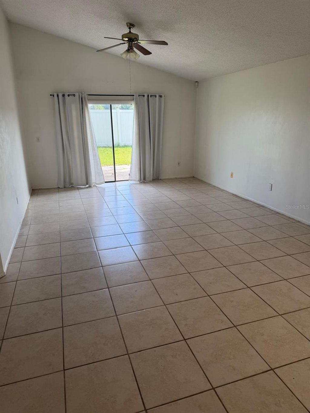 Photo of 1015 Ocala Woods Lane, Orlando, FL 32824 (MLS # O6416795)