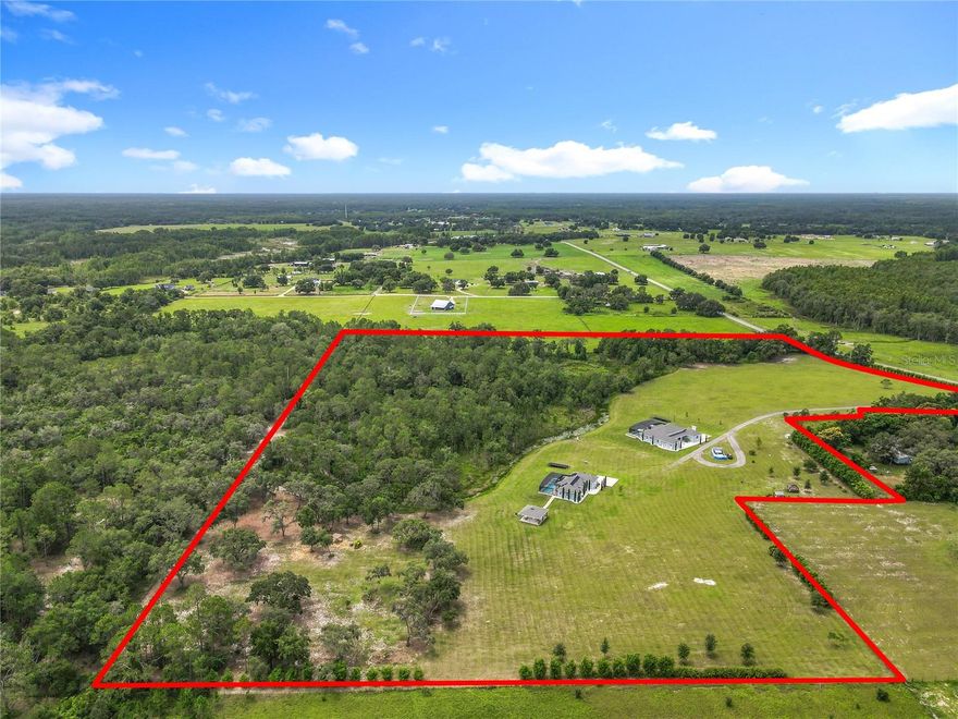 Rare 30-Acre Multifamily Estate with Two Homes, Two Pools, and Infinite Possibility. Some properties are simply places to live, this is not one of them. Set behind private gates on 30 park-like acres, this extraordinary estate offers two beautifully appointed single-family homes, two solar-heated saltwater lap pools, and a landscape so thoughtfully cultivated it borders on art. With 5 bedrooms, 7 bathrooms, and zoning that allows for a third structure or barn, this is a rare canvas for those who demand both luxury and freedom. A living, breathing sanctuary with over 300 hand-selected trees (valued at more than $200K) frame a curated private forest with a cleared walking path and a serene creek along the rear of the property. Towering bamboo creates a natural privacy wall, while an orchard of avocado, mango, lemon, lime, peach, and loquat delivers seasonal abundance. Deer, cranes, and songbirds complete the scene. Built for wellness & sustainability, every detail reflects an intentional approach to healthy living: a top-of-the-line Leaf whole-property water filtration system, three wells (including two dedicated to irrigation), three fully paid-off solar systems, and non-toxic natural fertilizers used exclusively throughout the grounds. Luxury here doesn't come at the expense of the environment — it's powered by it. Designed for living & entertaining, two elegant gazebos anchor the outdoor entertaining spaces — one fully equipped with electricity, a ceiling fan, and electronic blinds. A Hawaiian-inspired garden, cleared land ideal for events or camping, and a dedicated target range round out the grounds. Whether you're hosting an intimate wedding, a forest bathing retreat, or a fireworks celebration under the stars, this property delivers. Inside, both homes are furnished with Serena & Lily pieces that balance relaxed luxury with timeless sophistication — available for a seamless turnkey purchase. Statement chandeliers, plantation shutters, and sweeping forest views from every window create an indoor-outdoor harmony that feels effortless and elegant. This private estate accommodates every vision — and invites you to bring your own. Opportunities like this don't happen often. Come experience it for yourself. Seller is motivated. Seller financing available.