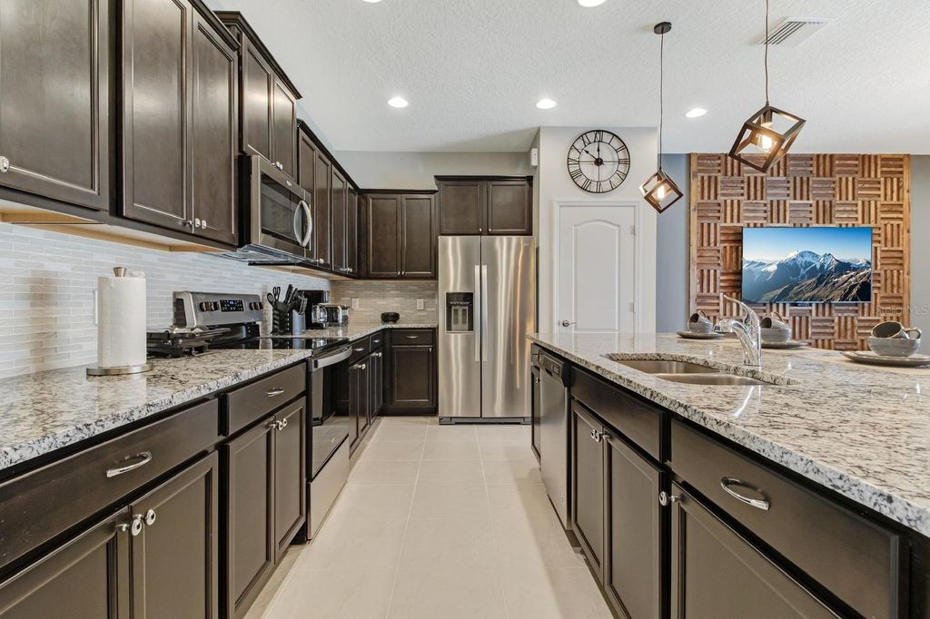 Photo of 2436 Dubai Street, Kissimmee, FL 34747 (MLS # O6345494)