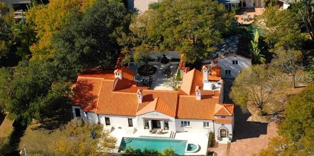 Luxury rental in the heart of Tampa. Beautiful Mediterranean estate built on 4 original lots on famous Davis Islands!. Available furnished for short or long term rentals; minutes from downtown Tampa. Enjoy living in complete relaxed elegance on this 5 Bed, 4.5 bath property with over 5,500 sq-ft of living space. Including an in-ground pool, remote controls for lights, heat, fountains, and jacuzzi. All new impact resistant windows & Doors! A grand master suite that opens to a spectacular courtyard! New kitchen with top of the line stainless steel appliances, Wolf-Subzero, wine cellar, and over 75 recessed lights. Extra large master bedroom. Amazing European Bathroom design with a victorian modern world bath-tub, rain shower, spray heads, and more. Flooring includes: stone, travertine, and wood. The family and living room areas have 2 fireplaces with exquisite mantels, arch ceilings, and venetian plaster walls. Guest house designed with wood and travertine floors, a private kitchen with adjacent walking wine cellar. Perfect home for entertaining or to enjoy quality family time. This Mediterranean Revival Style compound property will provide you with the feeling of being on your own secret Oasis in Tampa Bay with a glamorous relaxing atmosphere. Just bring your clothes for your 5 star hotel experience.