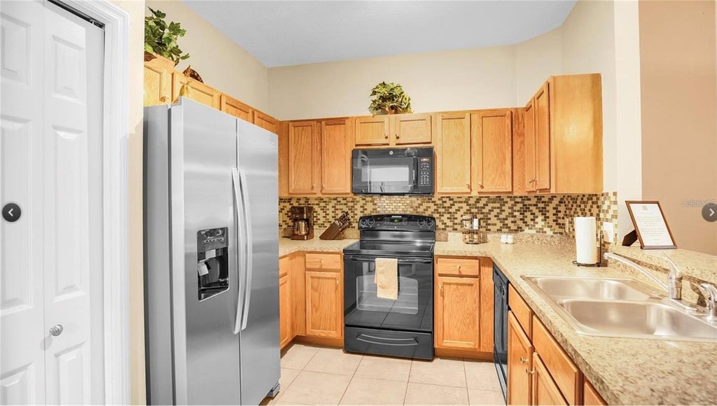 Photo of 2711 Oakwater Drive #2711, Kissimmee, FL 34747 (MLS # O6454172)