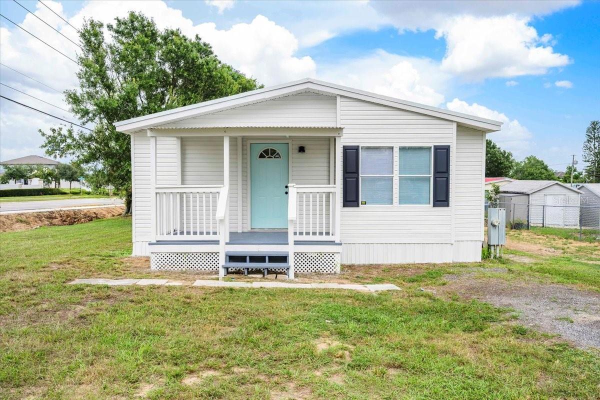 This beautifully remodeled 3-bedroom, 2-bath home in Davenport offers a fresh, modern aesthetic and a welcoming layout that’s truly move-in ready. Step onto the inviting front porch—perfect for morning coffee or evening unwinding—and into a light-filled interior featuring luxury vinyl plank flooring, a soft neutral color palette, and stylish updates throughout. The kitchen shines with crisp white cabinetry, quartz countertops, stainless steel appliances, and an open layout that flows seamlessly into the dining and living areas, ideal for entertaining or everyday comfort. Both bathrooms have been thoughtfully upgraded with contemporary vanities, fixtures, and tilework. Outside, the refreshed curb appeal and spacious backyard provide a private retreat with room to personalize. With an attached garage, extended driveway, and no HOA or CDD fees, this home blends charm, functionality, and freedom. Conveniently located near I-4, shopping, dining, and Central Florida attractions, it’s a standout opportunity for first-time buyers, downsizers, or investors seeking a turnkey property.