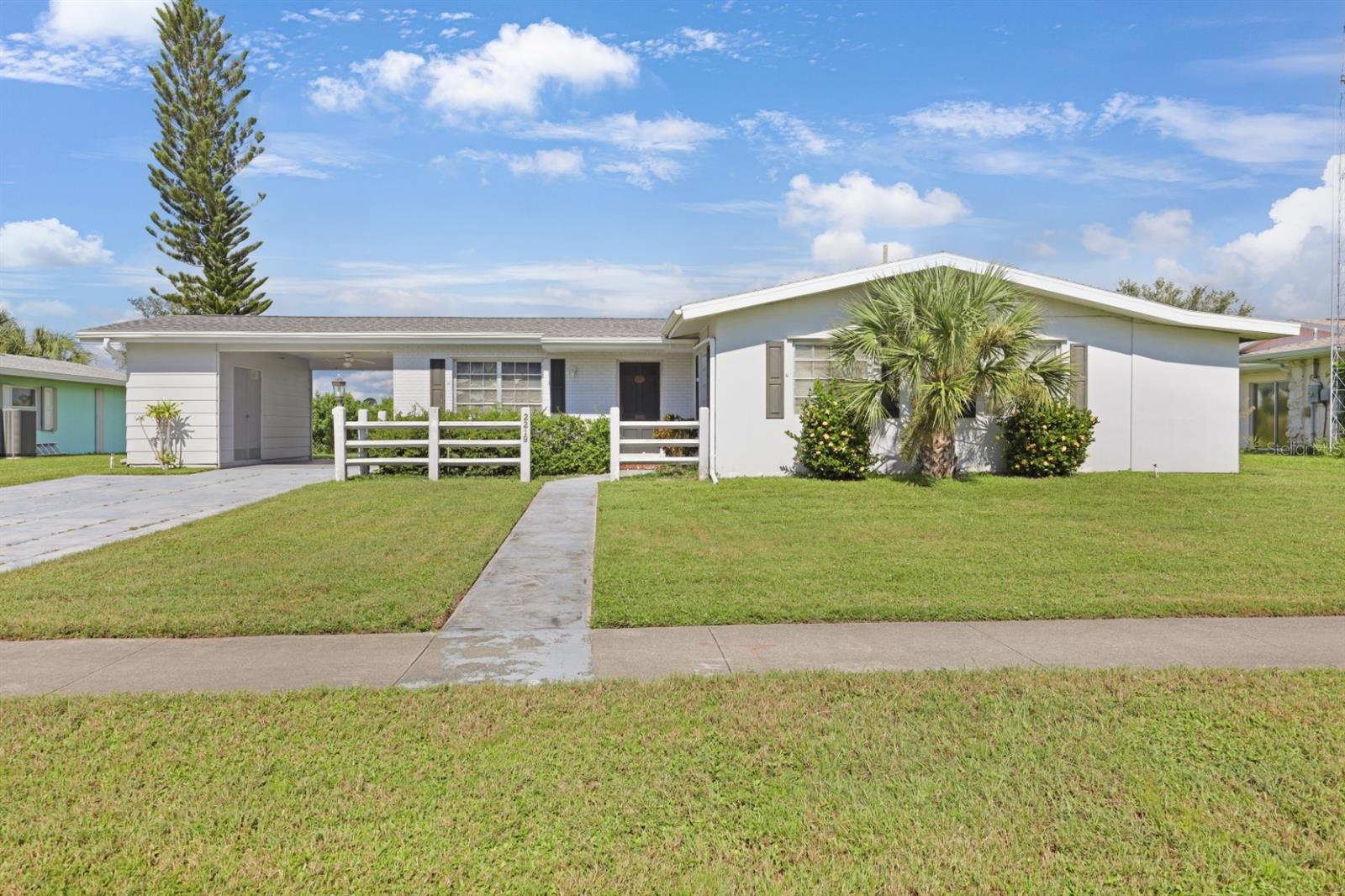 Welcome to this inviting 1963 two-bedroom, two-bathroom home located in the heart of Port Charlotte. Perfectly located near shopping, dining, golf courses, parks, boat ramps, gulf coast beaches and all that southwest Florida has to offer. This spacious home offers comfort, convenience and the relaxed Florida lifestyle you’ve been looking for. Step inside to find a bright living area with a layout designed for easy living. The kitchen provides ample cabinet space and functionality, making meal preparation a breeze. Both bedrooms are generously sized, and the home’s classic design gives you endless potential to add your personal touch. Outside, you’ll enjoy a spacious yard for outdoor entertaining, gardening, or simply relaxing in the Florida sunshine. A prime location close to schools and community amenities, this property is a great opportunity for first-time buyers, seasonal residents, or investors. Don’t miss your chance to own a piece of Florida paradise.