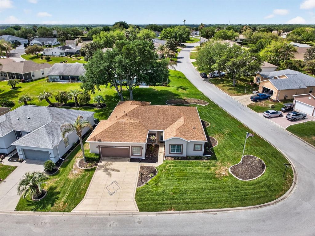 Photo of 5036 Sawgrass Lake Circle, Leesburg, FL 34748 (MLS # O6395800)