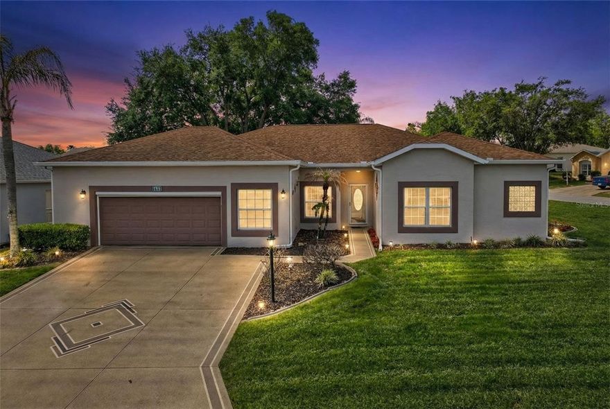 This beautifully maintained 2001 home truly shows like new and sits on a prime corner lot with great curb appeal, highlighted by a decorative driveway and well-kept landscaping.

One of the standout features is the enclosed 276 sq ft Florida room—bright, inviting, and designed for year-round use with its own mini-split system. With sliding glass doors from the kitchen, living room, and primary suite, it’s the perfect space to relax or entertain with plenty of natural light.

Inside, the layout offers rare flexibility with two primary suites, each with its own private full bath—ideal for guests or added privacy. Both suites include custom built-in closet organizers, and the main primary features dual sinks and two closets.

The kitchen is warm and functional with solid wood cabinetry, Corian countertops, reverse osmosis system, and a comfortable eat-in dinette area. There’s also a spacious indoor laundry room with extra storage and a convenient half bath.

The oversized 690 sq ft garage is a big bonus, featuring 11’9” ceilings, overhead storage racks, and an electric roll-down screen—perfect for catching a breeze while working or relaxing. Additional upgrades include tinted thermal-pane windows, hardwired data/internet lines, leaf-guard gutters, and a 2017 roof and Trane AC that’s been well maintained. Generator-ready home with a generator transfer switch installed

Located in Sawgrass Village within Plantation at Leesburg, this active 55+ community offers true resort-style living with two golf courses, three clubhouses, heated pools, tennis, pickleball, and more. You can even hop on your golf cart and head to the on-site restaurant for live music, good food, and time with friends.