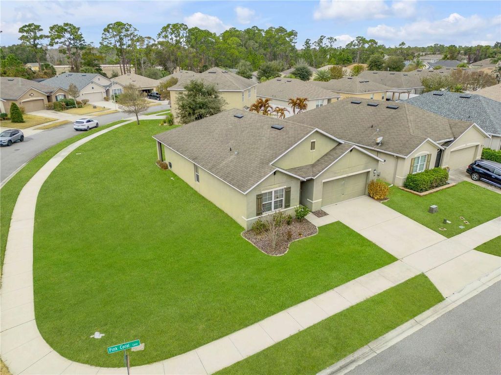 Photo of 402 Pink Coral Lane, New Smyrna Beach, FL 32168 (MLS # NS1087398)
