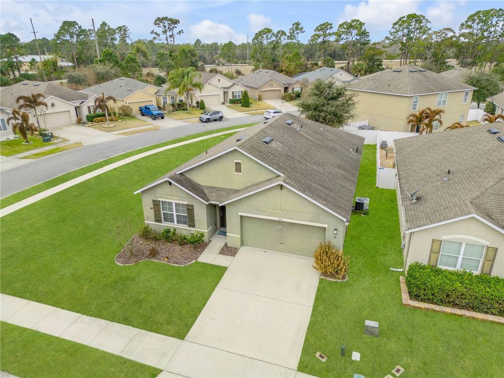 Photo of 402 Pink Coral Lane, New Smyrna Beach, FL 32168 (MLS # NS1087398)