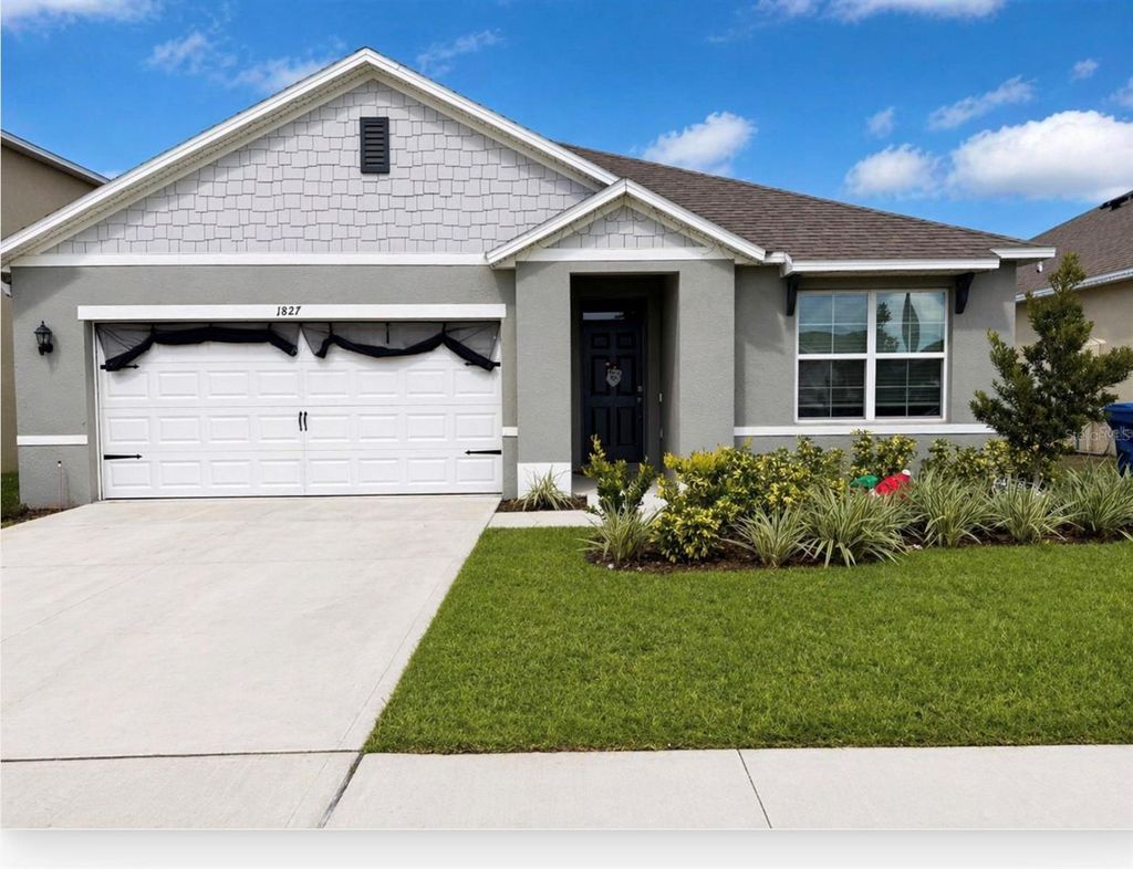 Photo of 1827 Silverbell Loop, Haines City, FL 33844 (MLS # S5148412)