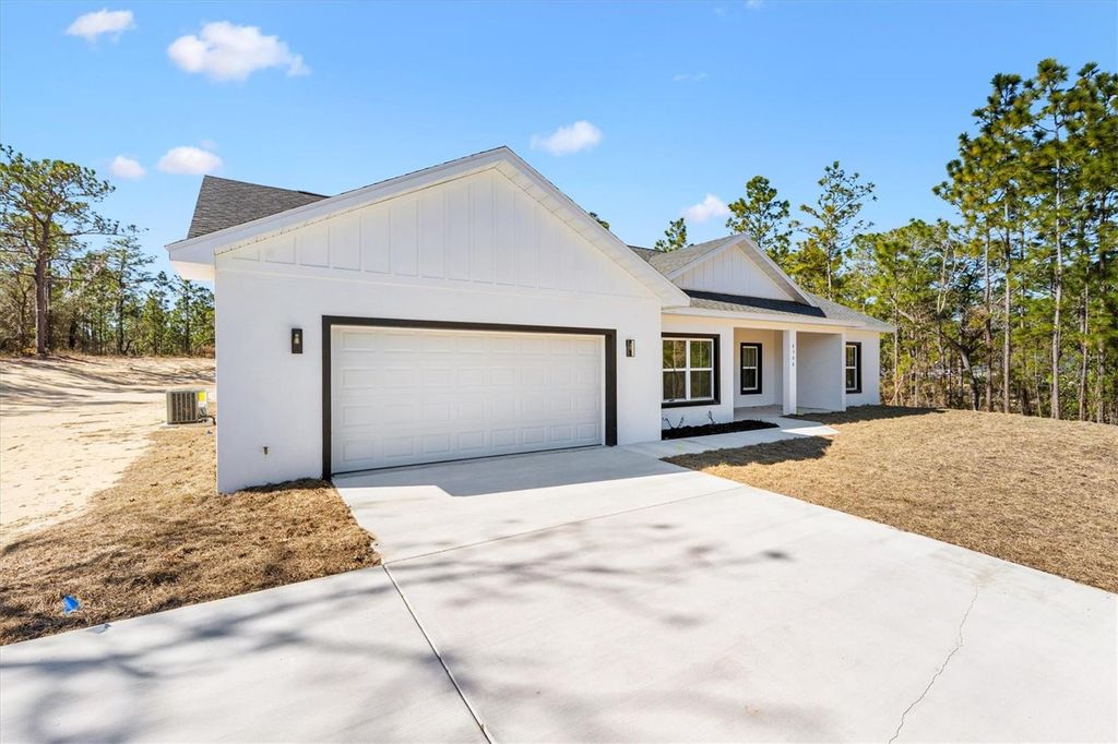 Photo of 8506 County Road 243, Wildwood, FL 34785 (MLS # G5107621)