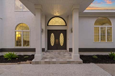 Photo of 6121 Bayside Drive, New Port Richey, FL 34652 (MLS # W7888152)
