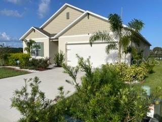 Owner Motivated! All reasonable offers will be considered. $4,000.00 Towards Closing Costs. With a $22,000 premium lot and $15,000+ of upgrades, this home is priced to sell. Located just minutes from the theme parks and attractions, Charles Cove is the perfect community to call home with its beautiful Florida lifestyle and resort amenities. This beautiful 4 Bedroom 2 Bath home, overlooks a conservation lot to the left and overlooks Lake Charles with a fenced back yard in the rear. The home is ideally located in Central Florida and boasts well-manicured landscaping and is walking distance to the community pool. The open floor plan allows for the ease of hosting family gatherings and other events. The open dining area hosts a beautiful view of Lake Charles. The Living room and Master bedroom has beautiful views of the lake as well. The kitchen has stylish backsplash and stainless steel appliances. The back porch is screened with SunPro automatic remote control screen and also has an extended porch for outdoor seating. This house includes TONS of amazing upgrades. The garage floor has been upgraded with Epoxy flooring. This home is a MUST SEE, you will not be disappointed. This home is also located in the cul-de- sac. Schedule your showing today, Don't miss the opportunity to call this your home.