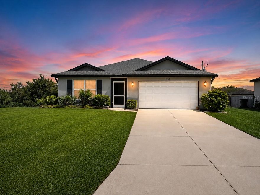 One or more photo(s) has been virtually staged. NORTH CAPE CORAL BEAUTY BUILT IN 2019 | 4 BEDROOMS | OPEN FLOOR PLAN | LOW MAINTENANCE LIVING

Welcome to this beautifully maintained 4 bedroom, 2 bathroom home located in one of North Cape Coral's fastest growing areas. Built in 2019 with durable CONCRETE BLOCK CONSTRUCTION, this move in ready home combines modern design, energy efficiency, and functional living spaces perfect for today's lifestyle.

Step inside and immediately notice the soaring CATHEDRAL CEILINGS and bright OPEN CONCEPT floor plan that create a spacious and inviting atmosphere. The heart of the home is the oversized kitchen featuring a large CENTER ISLAND, STAINLESS STEEL APPLIANCE PACKAGE, abundant cabinet space with 30" upper cabinets, and seamless flow into the dining and living areas, making entertaining effortless.

The private primary suite offers a relaxing retreat complete with a WALK IN SHOWER and generous closet space. Three additional bedrooms provide flexibility for family, guests, a home office, or hobby space.

Enjoy Florida living year round on the COVERED UNDER TRUSS LANAI overlooking the backyard, perfect for outdoor dining, morning coffee, or evening relaxation.

Additional upgrades include:

• LENNOX 14 SEER HIGH EFFICIENCY AC SYSTEM
• PGT LOW E INSULATED WINDOWS FOR ENERGY SAVINGS
• MOEN PLUMBING FIXTURES
• DIMENSIONAL SHINGLE ROOF
• WATER TREATMENT SYSTEM
• IRRIGATION SYSTEM
• 18" TILE FLOORING IN KITCHEN AND BATHS
• CONCRETE BLOCK CONSTRUCTION FOR DURABILITY AND STORM RESISTANCE

Conveniently located near shopping, dining, schools, parks, boating, fishing, golf courses, Punta Gorda, Fort Myers, Matlacha, Pine Island, and Southwest Florida beaches.

This home offers the perfect combination of modern construction, energy efficiency, and Florida lifestyle living. Schedule your private showing today before this North Cape Coral gem is gone.