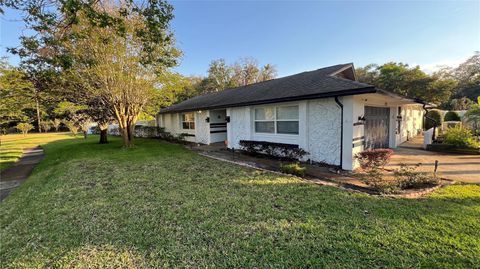 Photo of 7730 Broken Arrow Trail, Winter Park, FL 32792 (MLS # O6300214)