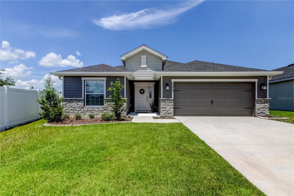 Photo of 35407 Bellington Boulevard, Zephyrhills, FL 33541 (MLS # TB8419561)