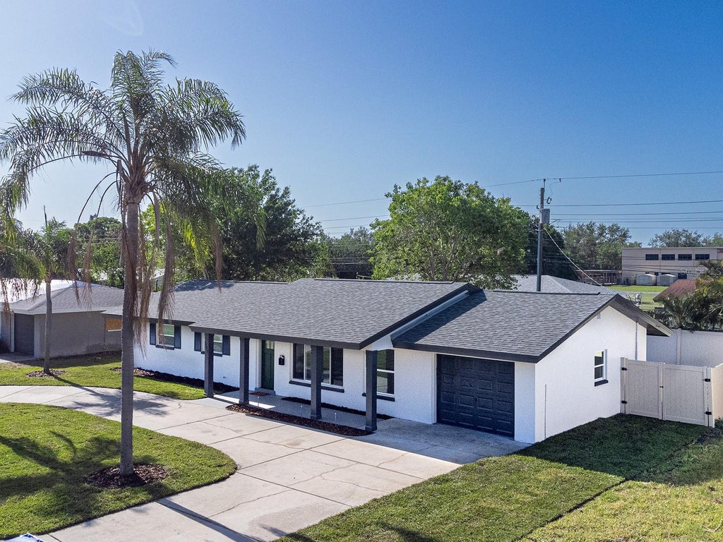 Photo of 352 79th Avenue NE, St Petersburg, FL 33702 (MLS # TB8544967)