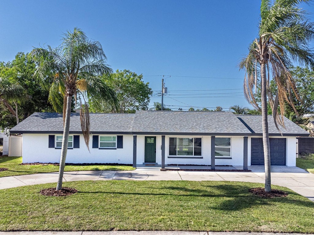 Photo of 352 79th Avenue NE, St Petersburg, FL 33702 (MLS # TB8544967)