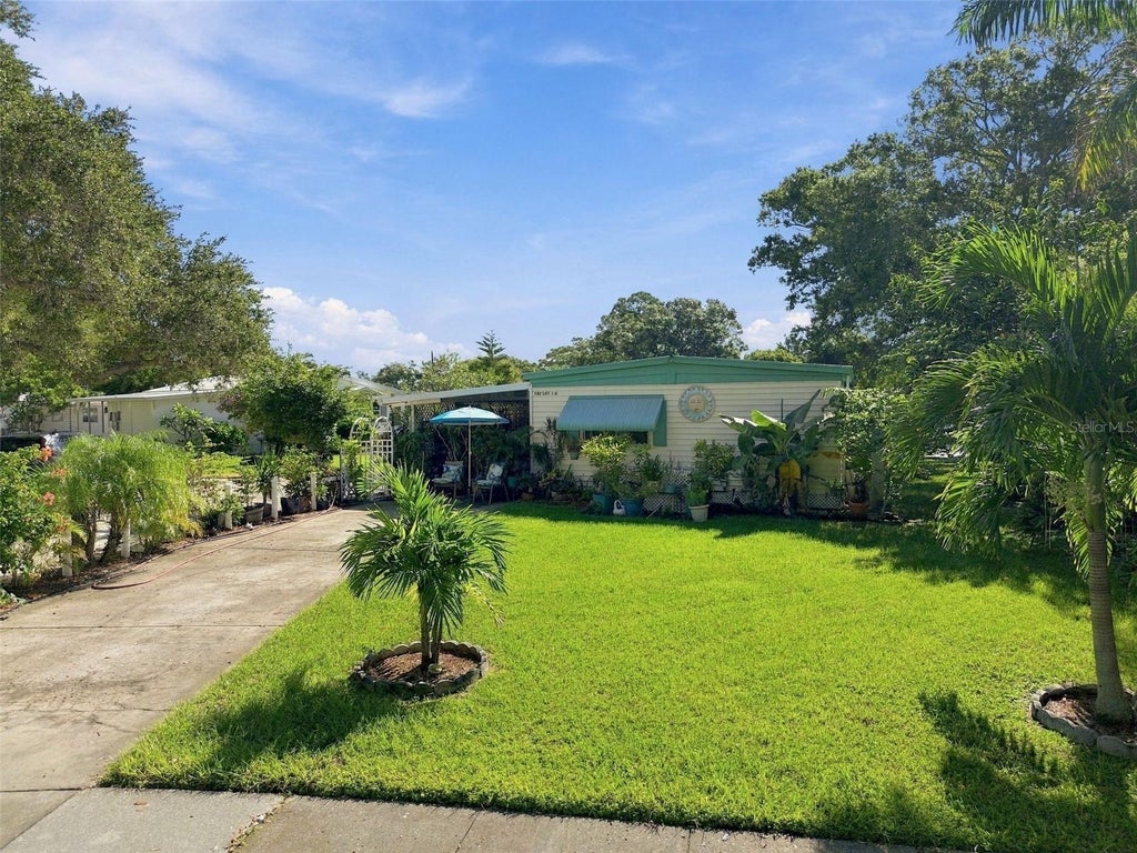 Photo of 980 7th Street NW #1A, Largo, FL 33770 (MLS # TB8550955)