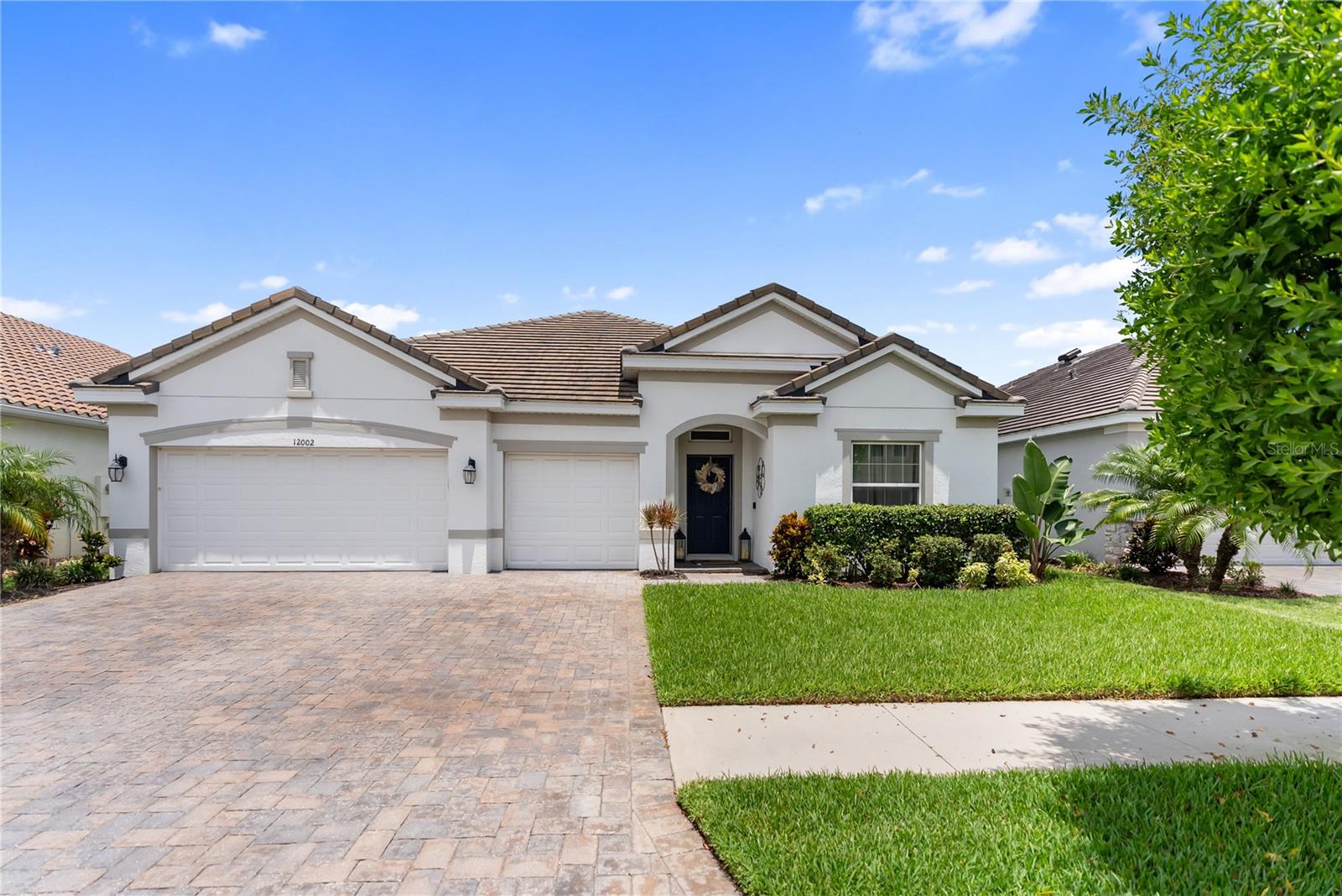 Discover Waterleaf – Luxury Living in a Premier Gated Community
Set in one of the area’s most desirable neighborhoods, this impressive 4-bedroom, 3-bath residence blends timeless elegance with modern convenience, all overlooking a tranquil water view.
From the moment you arrive, the tile roof, paver driveway and front porch, and lush, Florida-friendly landscaping set the tone for what awaits inside. The foyer opens to an inviting formal living and dining space, flowing seamlessly into a light-filled great room that connects the family room, casual dining area, and a chef’s kitchen.
The kitchen is a showstopper with extensive granite counters, a large center island, stainless steel appliances, and abundant cabinetry, making it ideal for both daily living and entertaining, also kitchen has been extended making it a beautiful extra luxury choice. Two dining areas offer flexibility, while a private office/flex room adapts to your needs.
The primary suite is a peaceful retreat, complete with a spa-style bath featuring a soaking tub, separate shower, and dual sinks. The three-car garage provides ample storage.
Waterleaf residents enjoy resort-inspired amenities including a sparkling pool, fire pit lounge, picnic pavilions, playground, half basketball court, fitness stations, and miles of walking trails, plus a dedicated dog park. This smart community ensures each home is equipped with integrated technology and high-speed fiber-optic internet
Situated minutes from shopping, dining, schools, medical facilities, parks, sports fields, and pristine beaches, with quick access to I-75, this location truly offers the best of Florida living. Taxes include CDD fees.