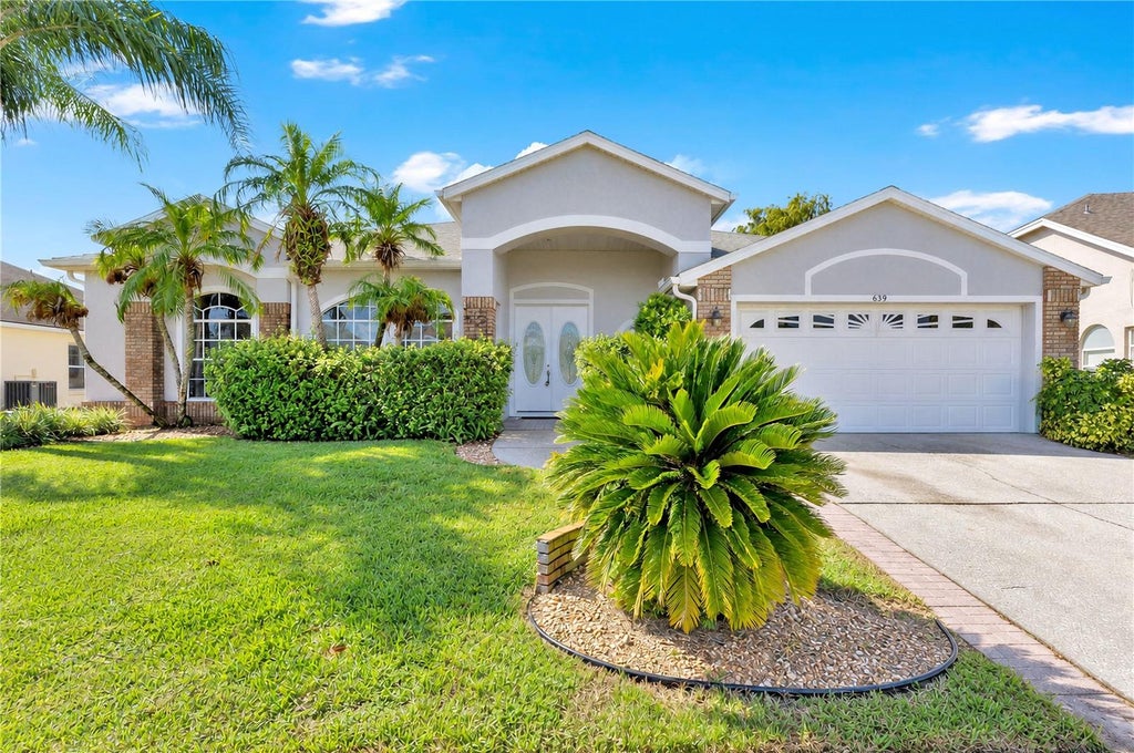 Photo of 639 Lakehaven Circle, Orlando, FL 32828 (MLS # O6451330)