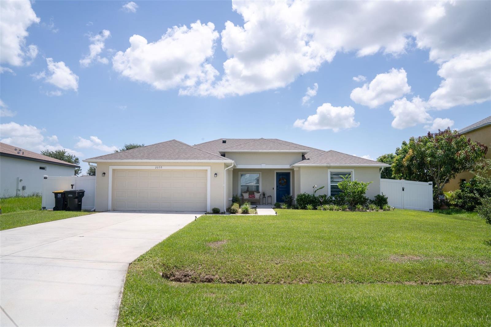 Welcome to Your Dream Home in the Heart of Poinciana! As you enter, you’ll be greeted by stunning 12-foot vaulted ceilings. This residence boasts a formal dining space, a modern kitchen, outfitted with stainless steel appliances, and an open-concept living area. The bathrooms continue the contemporary theme featuring subway tile and shaker style cabinetry, elegant quartz countertops, and a tranquil environment for unwinding. The outdoor living space is equally impressive, showcasing a covered rear porch and a generous patio- perfect for al fresco dining and entertaining guests. Poinciana is a recreational haven, offering numerous parks and shopping opportunities. Your chance to claim this exceptional gem is here! Don’t miss the opportunity to make this Dream Home yours!