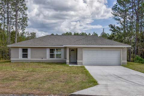 Photo of 487 Malauka Radial, Ocklawaha, FL 32179 (MLS # OM729558)