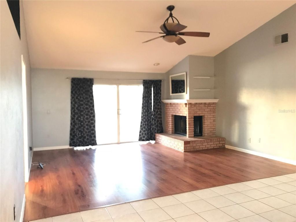Photo of 12801 Ben Rogers Court, Orlando, FL 32828 (MLS # O6352619)
