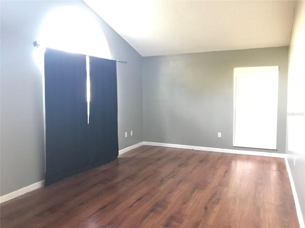 Photo of 12801 Ben Rogers Court, Orlando, FL 32828 (MLS # O6352619)