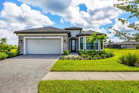 Photo of 4400 Lakeside Grove Place, North Port, FL 34289 (MLS # C7515023)