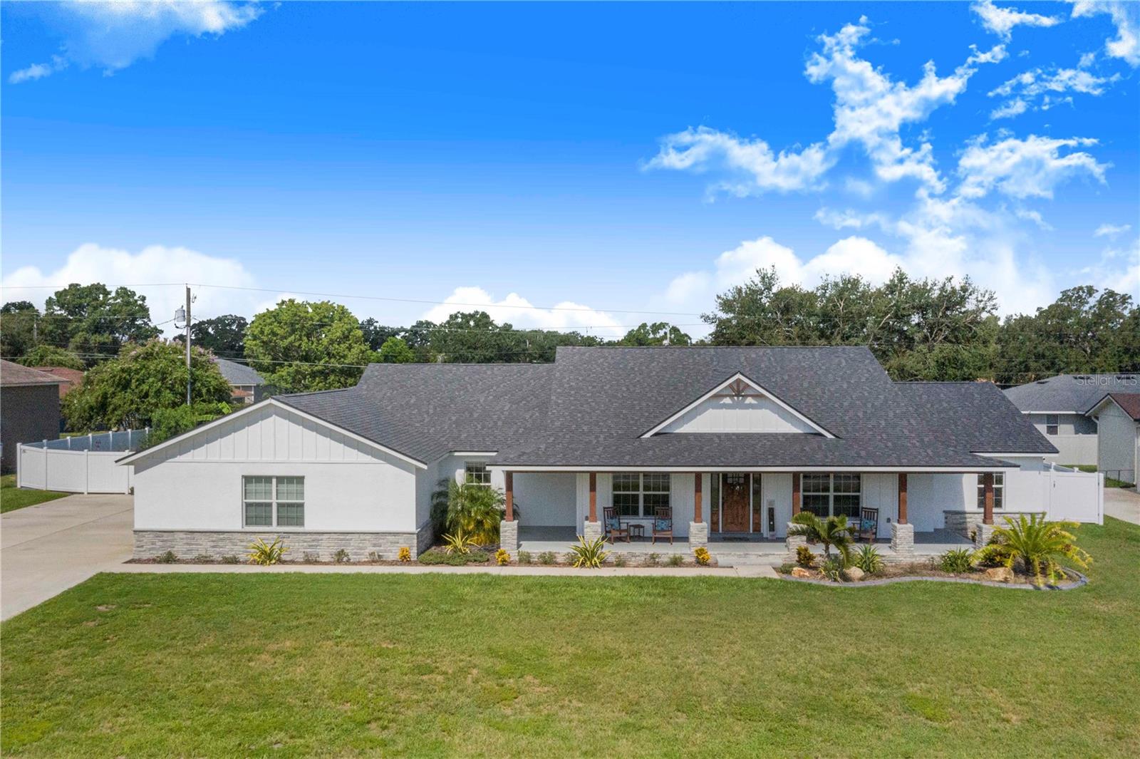 Welcome to 2812 Murcott Street in beautiful Auburndale, FL! This exceptional home combines custom, one of a kind craftsmanship, modern upgrades, and thoughtful design—perfect for those seeking both luxury and function. This is a 6 bedroom 3 bathroom home that has a new inground saltwater pool with a huge screened in pool cage.
Inside, you'll find solid wood cabinetry and granite countertops throughout, along with elegant granite window sills that add a refined touch. The spacious layout includes walk-in closets in all bedrooms, a custom pantry, and a custom-designed master suite featuring a spa-like bath and an expansive, custom master closet that must be seen to be appreciated.
An electric fireplace creates a cozy focal point in the main living area, while a large walk-up attic provides incredible storage potential. Off the oversized 3-car garage, you’ll find a generous storage room, ideal for seasonal items, tools, or hobby gear. The home is equipped with a security system and exterior cameras for added peace of mind.
Step outside to your private oasis! The backyard features a magnificent new saltwater pool, new pool cage, and new pavers, creating a picture-perfect retreat that really sets this home apart from the rest. Entertain with ease using the outdoor TV hookup, or simply relax in your 6ft privacy-fenced yard surrounded by fruit trees.Tons of room for private and protected outdoor entertainment. There’s even a separate fenced area for dogs, keeping your furry friends safe and happy. The irrigation system helps maintain the beautifully landscaped property with ease.
An extended driveway offers plenty of parking space for multiple guests, RV or any size boat that you can put on a trailer. This home's curb appeal shines with every detail meticulously maintained.
Located in a peaceful neighborhood with easy access to local amenities. Very short distance to Polk Parkway which provides easy access to all local major roadways adding to the ease of a day trip to Tampa or Orlando or to either coast.
This home is a gem and a very rare find offering space, style, and custom features throughout. Don’t miss your chance to own this one-of-a-kind property—schedule your private showing today!