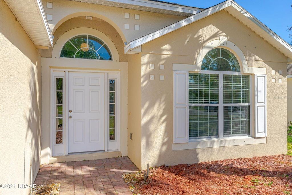 Photo of 3913 Sunset Cove Drive, Port Orange, FL 32129 (MLS # NS1086492)