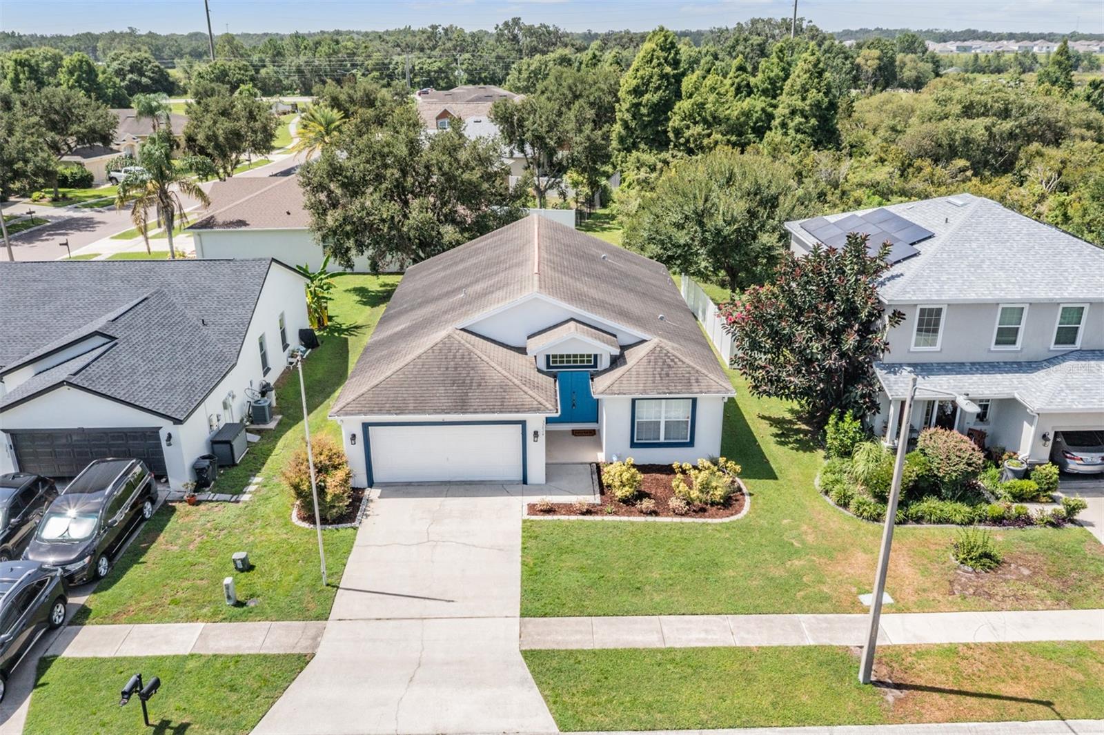 Charming 3-bedroom, 2-bath home in a quiet cul-de-sac with no CDD and low HOA! Features a spacious open-concept living and dining area with vaulted ceilings. The primary bedroom is located at the rear of the home with private access to the enclosed outdoor patio. Enjoy a large walk-in closet, soaking tub, and separate shower in the ensuite bath. A great opportunity to own in a serene neighborhood!