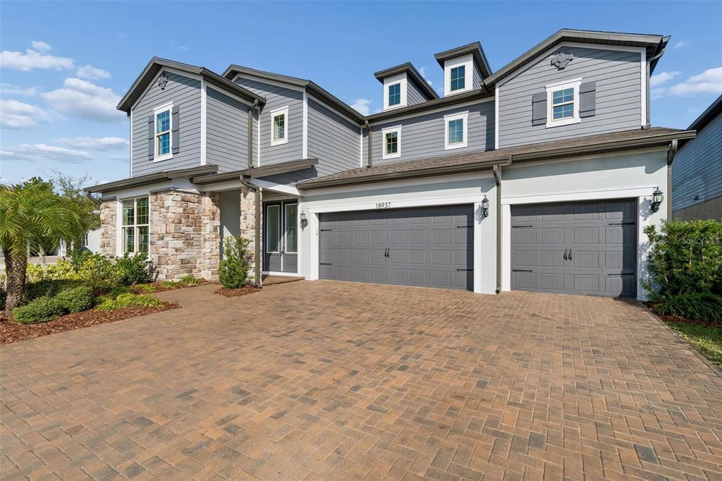 Photo of 18937 Willowmore Cedar Drive, Lutz, FL 33558 (MLS # TB8474249)