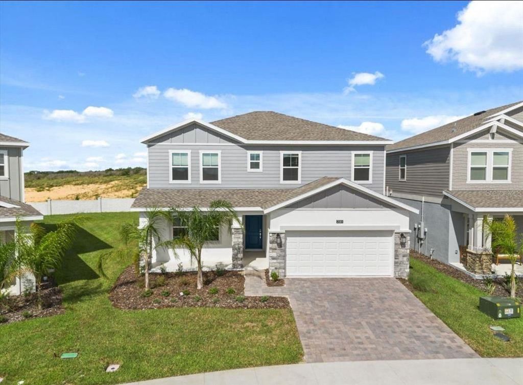 Photo of 2581 Runners Circle #A, Clermont, FL 34714 (MLS # O6356260)
