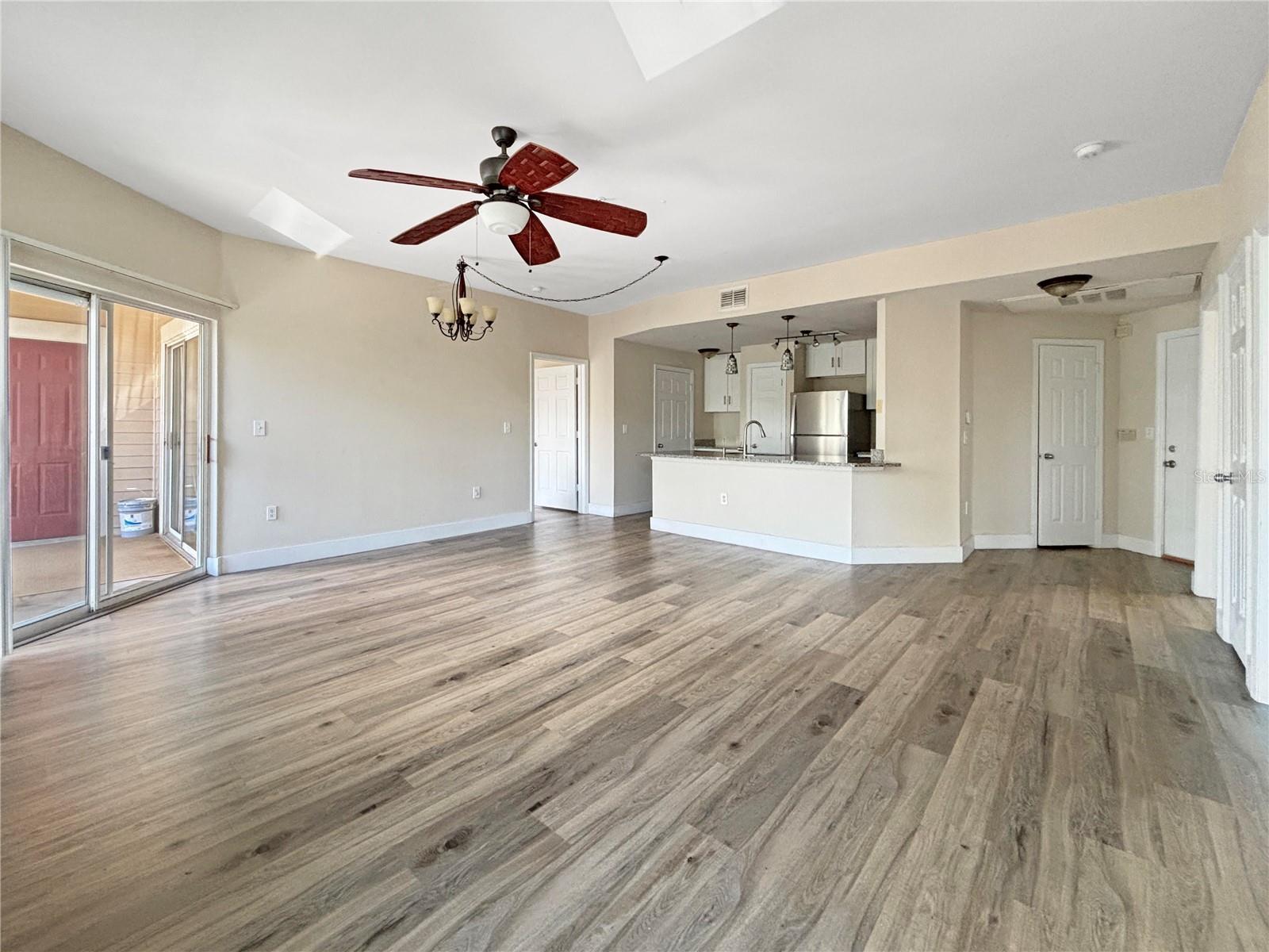 Step into this beautifully updated 2-bedroom, 2-bathroom condo offering 1,031 sq. ft. of stylish living space in the desirable Bordeaux community of Ocoee. This bright, open-concept home features a modern kitchen with granite countertops, stainless steel appliances, and a spacious island perfect for entertaining. The living area boasts abundant natural light, wood-look flooring, and a cozy fireplace, creating a warm and inviting atmosphere. Both bedrooms are generously sized, with the primary suite including a private bath and ample closet space. Enjoy your morning coffee or evening unwind on the private balcony with peaceful views. Located just minutes from West Oaks Mall, shopping, dining, major highways, and entertainment, Bordeaux offers a gated community with amenities such as a pool, fitness center, and clubhouse. This is the perfect combination of comfort, convenience, and style—ready for you to move right in!