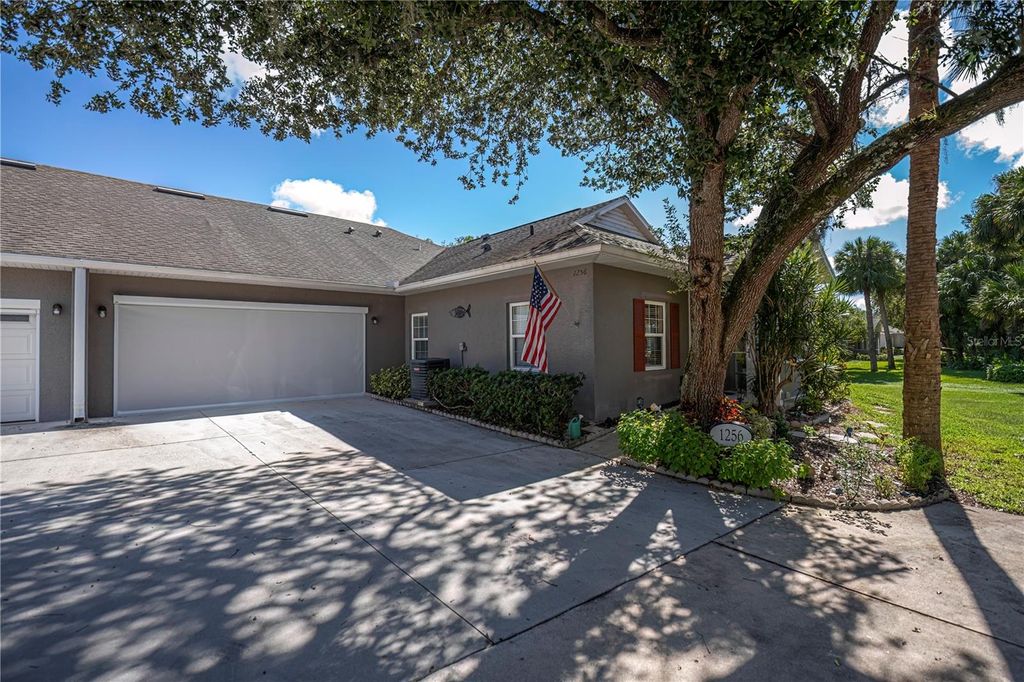 Photo of 1256 Green Oak Trail, Port Charlotte, FL 33948 (MLS # C7515450)