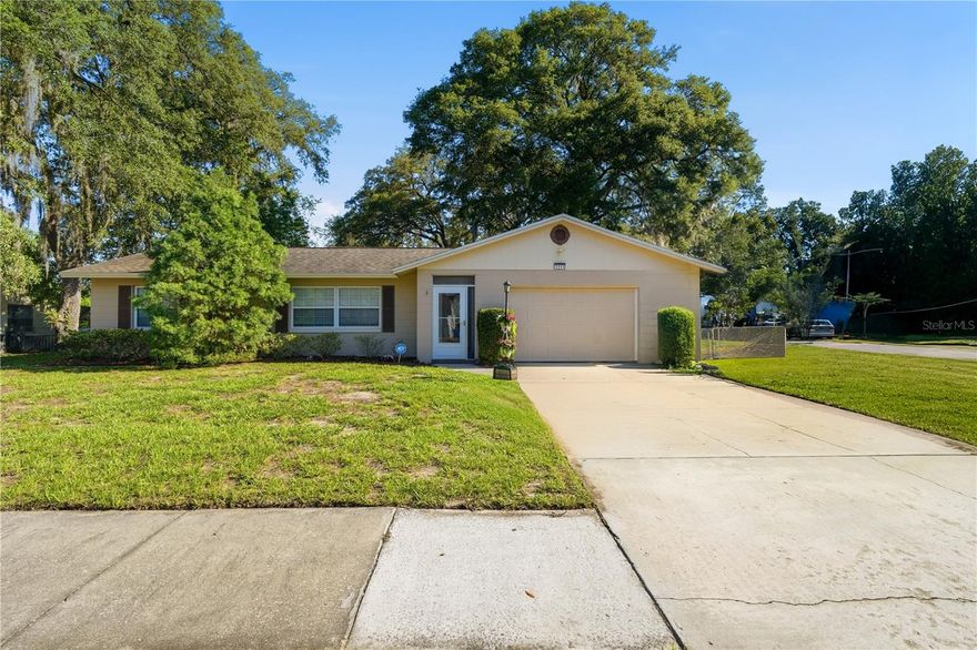 Move-in ready, this spacious DeLand home offers comfort, functionality, and peace of mind with major systems updated in 2019 for favorable insurance considerations. Featuring a desirable split floor plan, the home includes a formal living room, dining room, cozy family room, and an additional Florida room providing flexible living and entertaining space. Situated on a large corner lot, the fully fenced backyard offers privacy and room to enjoy the outdoors. Relax or entertain on the oversized patio complete with a firepit area—perfect for gatherings year-round. Conveniently located near shopping, dining, and historic downtown DeLand. Information deemed reliable but not guaranteed. Buyer and buyer’s agent to verify all measurements and property details independently.