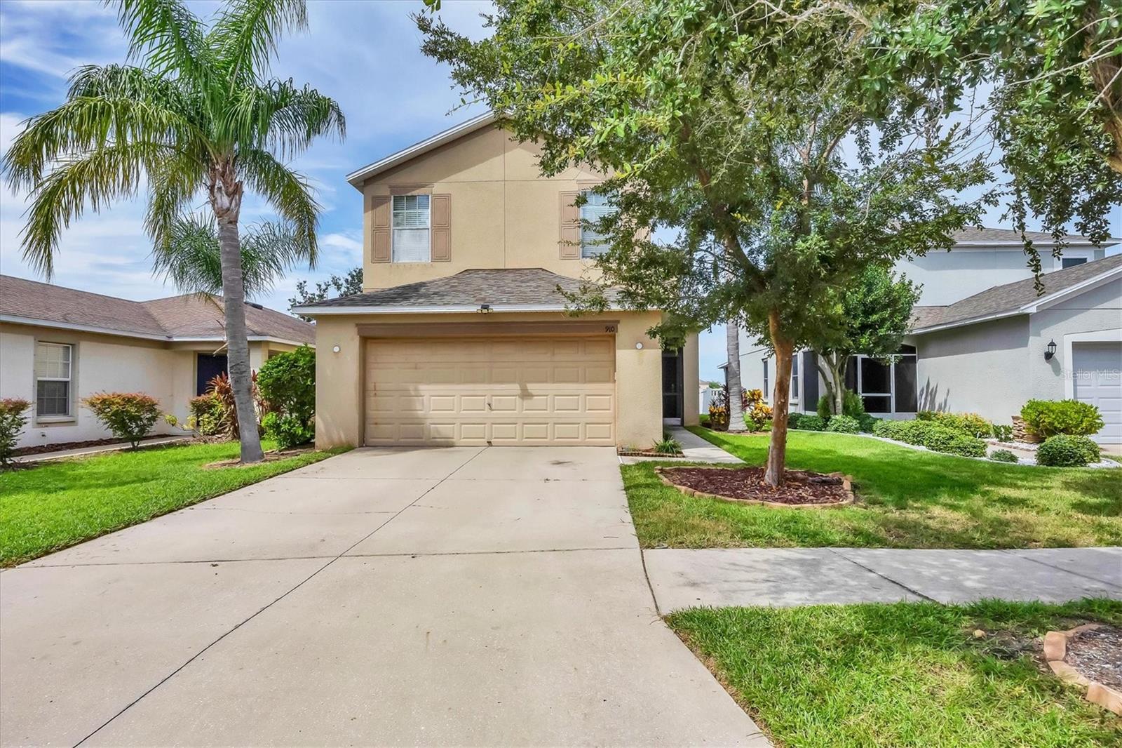 One or more photo(s) has/have been virtually staged. Come see this spacious three-bedroom, two-and-a-half bath home with a two-car garage and large, screened lanai in the desirable Bahia Lakes Community. For greater peace of mind, the home received a NEW ROOF in 2023 and a NEW HVAC system in 2025 (with a 10-year warranty). As you enter the front door through the screened porch, you’ll arrive in the foyer area boasting high ceilings with natural light pouring through the foyer window. Stepping forward into the expansive living room/great room, you’ll notice plenty of space for relaxing and entertaining. To the left, the gorgeous kitchen with granite counters overlooks the dining/great room, creating a wonderful layout for hosting. The dining room leads out to an extra-large, extended lanai where lovely water views provide a serene setting. Imagine relaxing in a lounger, taking in the nature right in your own backyard. Back indoors, through the kitchen, is the laundry room and pantry. Down the hallway is a half bath, the doorway to the garage, as well as a cleaning closet with extra storage under the stairs. At the top of the stairs is a landing area perfect for a desk, workspace, or reading nook. The nearby primary suite is bright and offers a variety of layouts because of its size. The primary bathroom houses a soaker tub, private toilet room, and a large walk-in closet. Both additional, sizeable bedrooms lend themselves to various configurations and one of the two rooms possesses a bonus walk-in closet. A linen closet sits just outside the second full bathroom providing ample storage. This home is a fantastic blank canvas for anyone wanting to put their own style, design touches, and beauty into it. The community offers scenic sidewalks, a beautiful pool area, community building, and playground. Extra parking is available for visiting guests and family. The home is ideally situated near Apollo Beach and Apollo Beach Preserve, Bahia Bay, multiple schools, a cozy library, fun food trucks, two gymnastics facilities, and a drive-in movie theater. A new Walmart is set to be built just minutes away, and the future Marketplace/Promenade in Apollo Beach will feature shops, banks, theaters, and hotels. Enjoy easy access to Highway 41 from this excellent location. Being in an X ZONE, flood insurance is NOT required. Whether hosting friends on the lanai or enjoying the neighborhood pool, this home provides the perfect balance of comfort and convenience. The seller is offering a $5,000 credit at closing to be applied to whatever the buyer deems most important whether closing costs, appliances, flooring, buy-down of interest rate, etc.