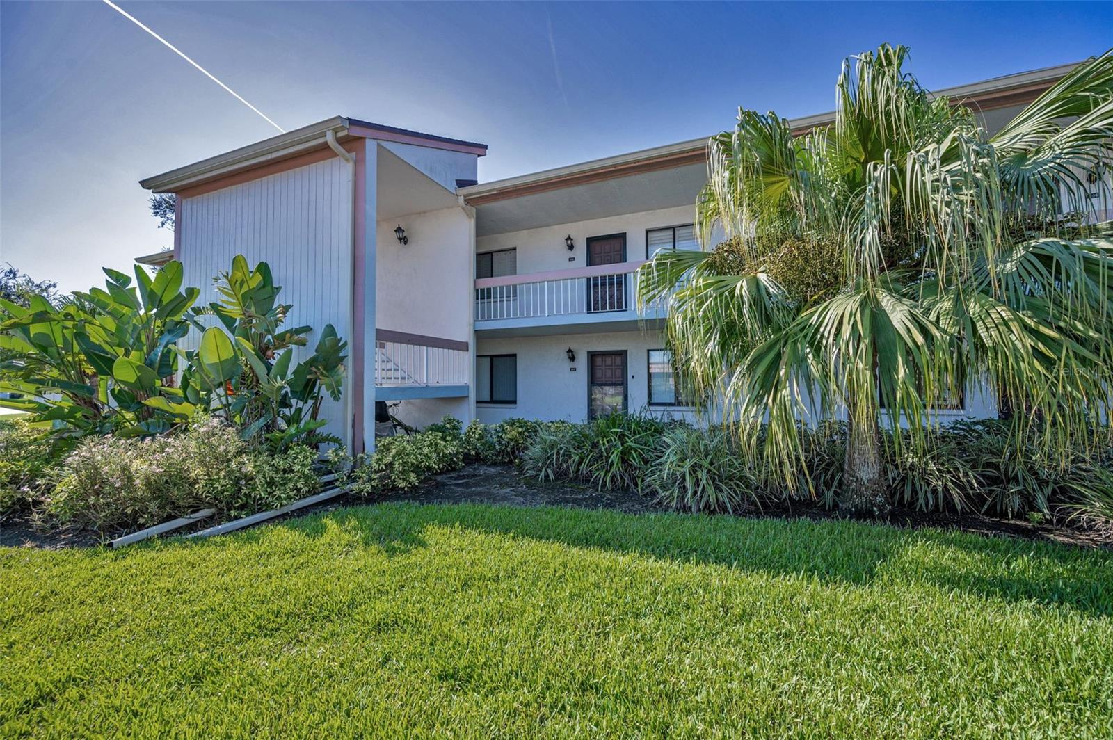 One or more photo(s) has been virtually staged. This East Lake Woodlands Waterview Condo is priced to SELL and SELL FAST, check out the comps!! Discover this beautifully updated 2-bedroom, 2-bath condo with a stunning lake view in the highly sought-after gated golf community of East Lake Woodlands in Oldsmar, Florida. This home features a newer roof, AC, hot water heater, and comes with a one-year home warranty for added peace of mind. With only two stories in the building and concrete between floors, you’ll enjoy a quiet and worry-free lifestyle of this ground floor, easy access unit. Highlights include: Covered carport just steps from your front door, Light-filled kitchen and open living/dining area with wood-burning
fireplace. Luxury vinyl flooring throughout, spacious screened lanai overlooking the water. All appliances included, even a washer and dryer. This home offers a split-bedroom floor plan for privacy, the primary suite is complete with walk-in closet, step-in shower, and lanai access!
East Lake Woodlands offers a desirable lifestyle with top rated schools, golf courses, shopping, and dining-all just minutes away. This is Florida living at its best! This home will not last, so check it out before it is GONE!!