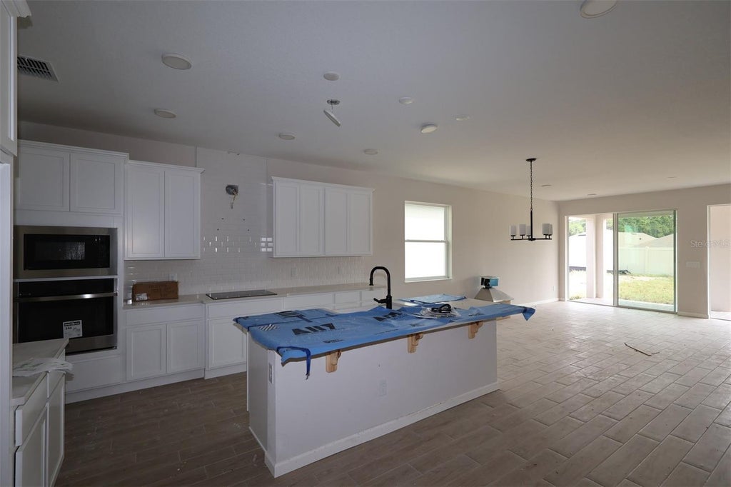 Photo of 6861 Yellow Warbler Bend, Saint Cloud, FL 34773 (MLS # O6449220)