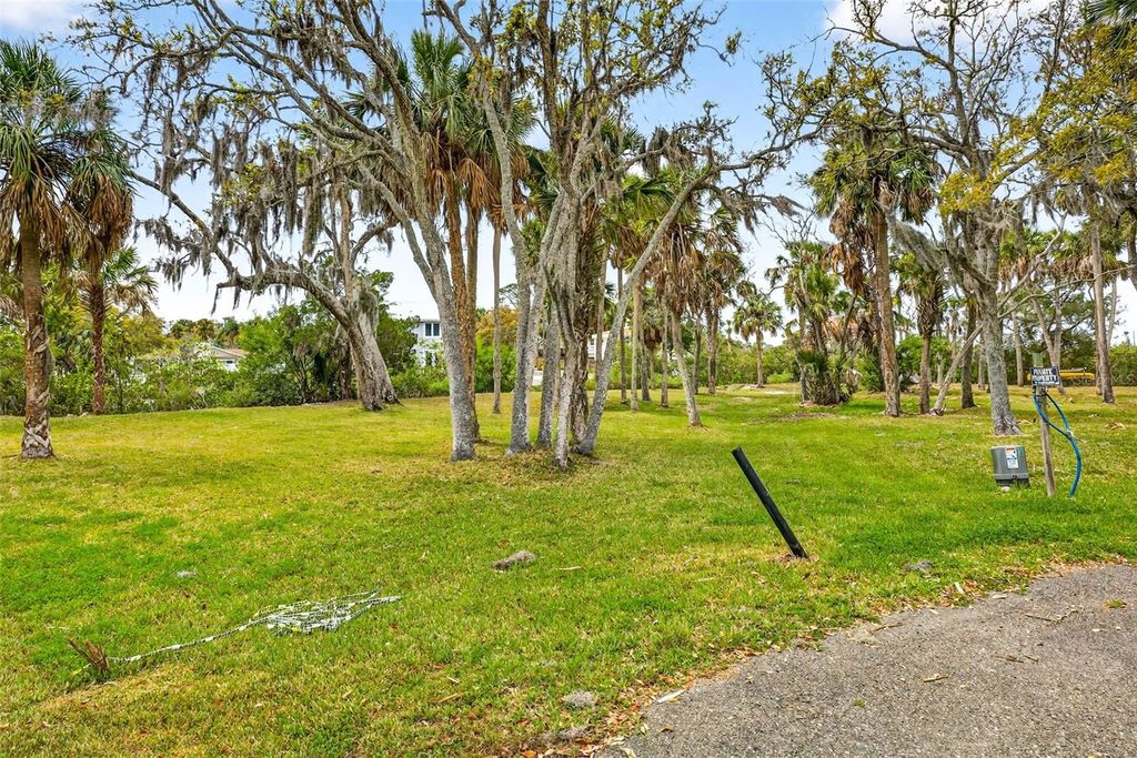 Photo of 5400 Tropical Woods Court, Port Richey, FL 34668 (MLS # W7883937)