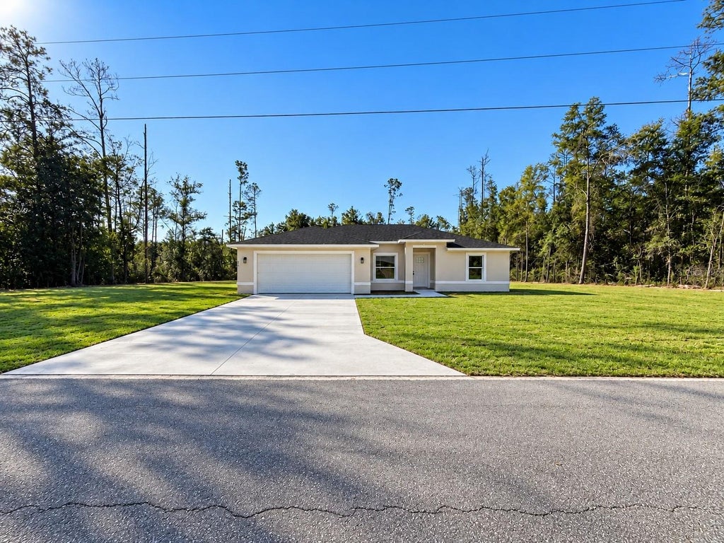 Photo of 21002 SW Cardinal Avenue, Dunnellon, FL 34431 (MLS # OM734715)