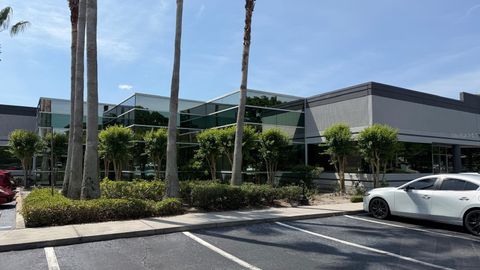 Photo of 7901 Kingspointe Parkway #8, Orlando, FL 32819 (MLS # O6405573)