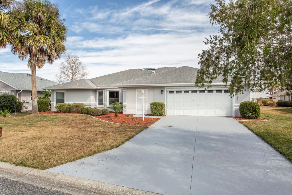 Photo of 5405 Queen Victoria Drive, Leesburg, FL 34748 (MLS # W7882213)