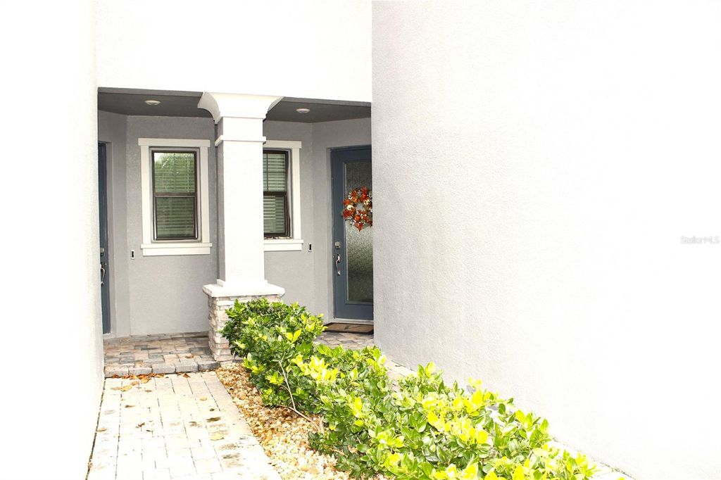 Photo of 4596 Almada Lane, Wesley Chapel, FL 33543 (MLS # TB8437166)