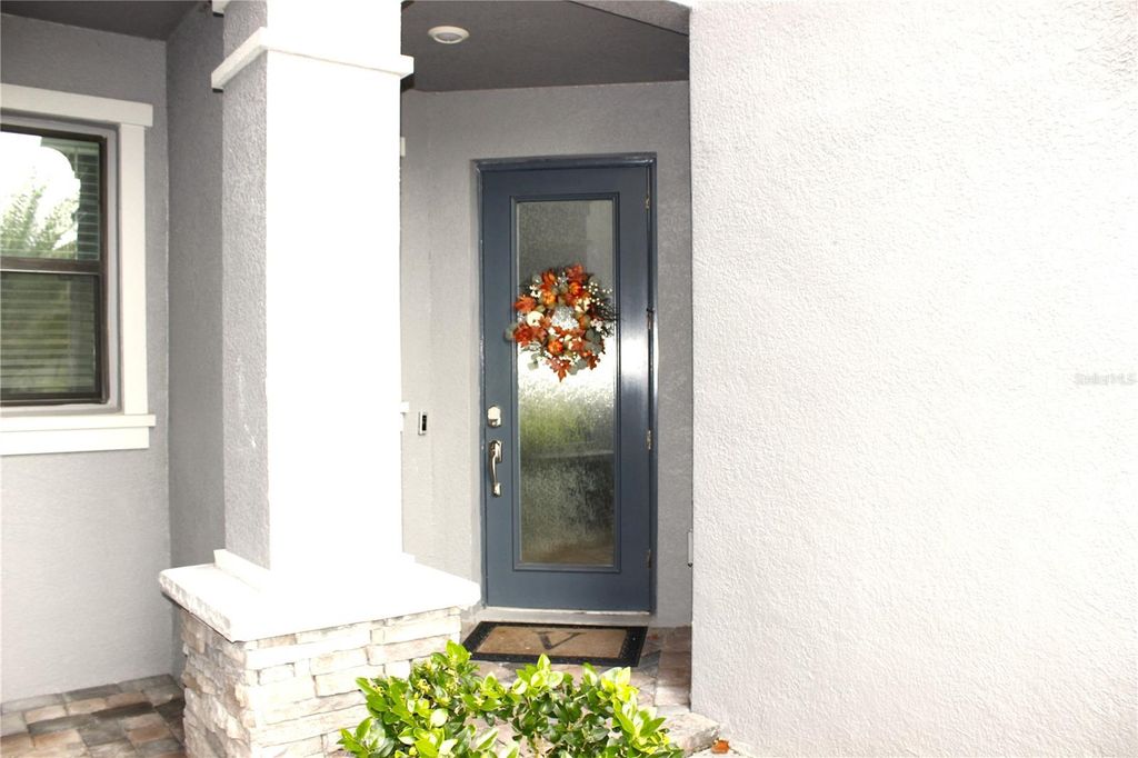 Photo of 4596 Almada Lane, Wesley Chapel, FL 33543 (MLS # TB8437166)