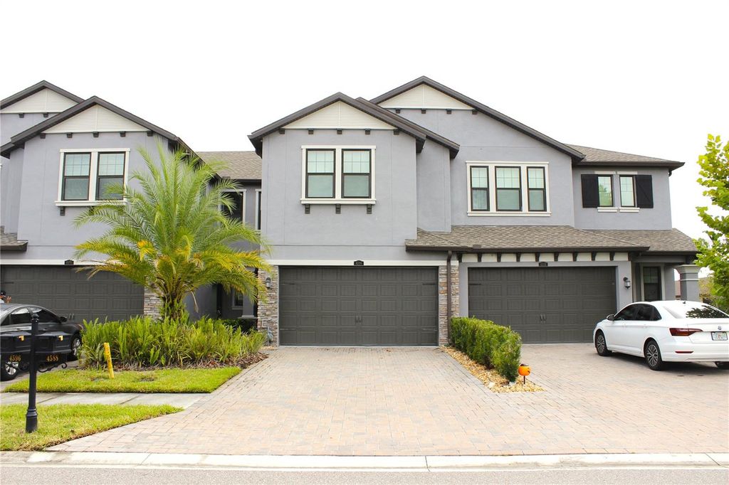 Photo of 4596 Almada Lane, Wesley Chapel, FL 33543 (MLS # TB8437166)